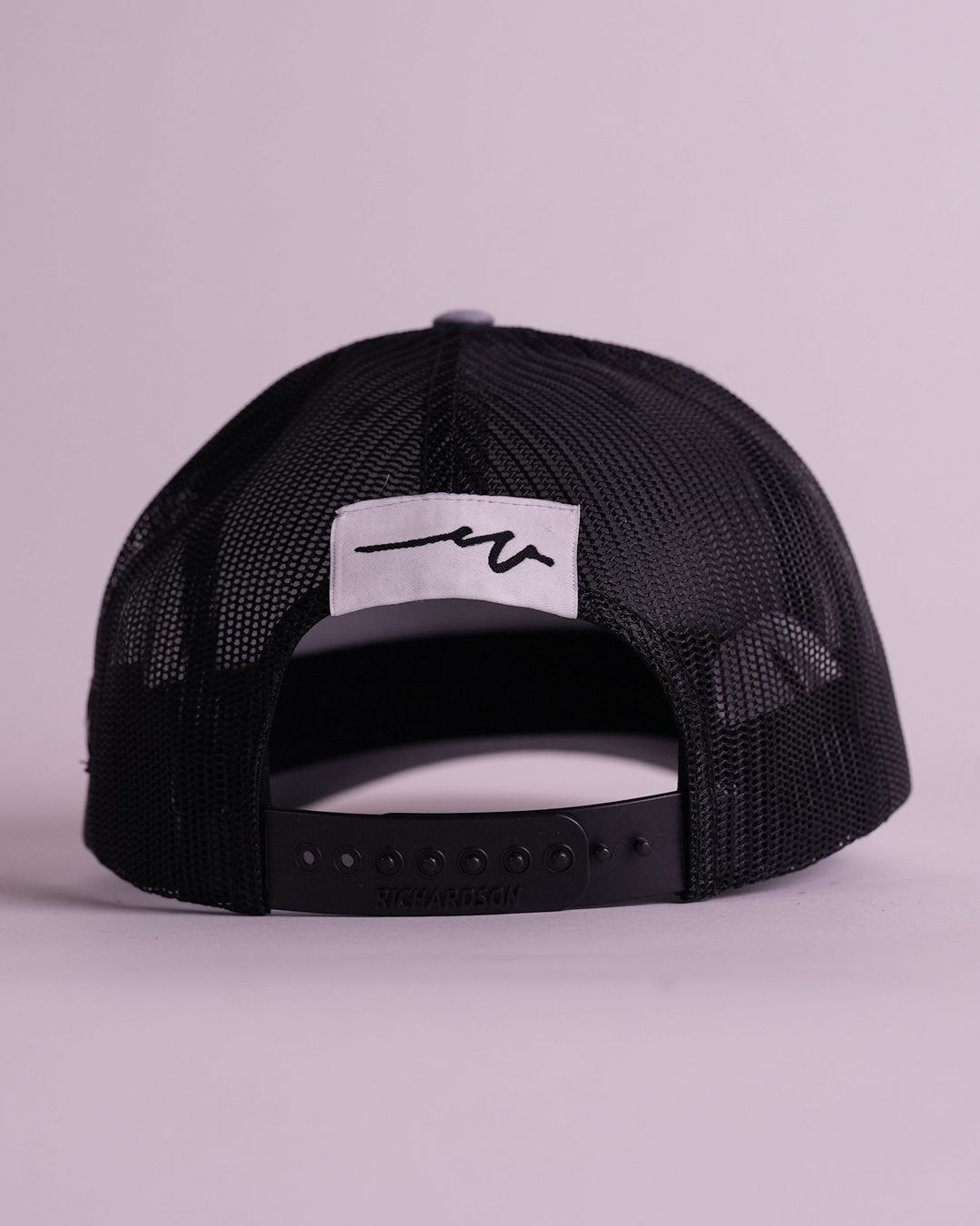 At The Mountains Trucker