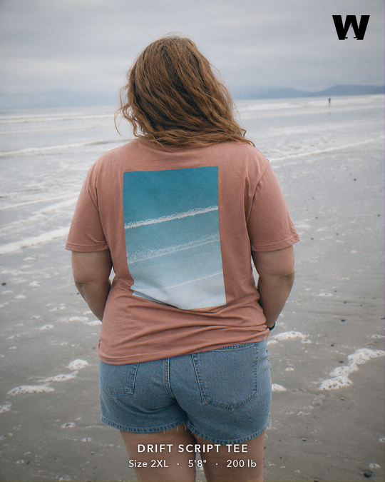 Drift Script Tee — worn back-print lifestyle