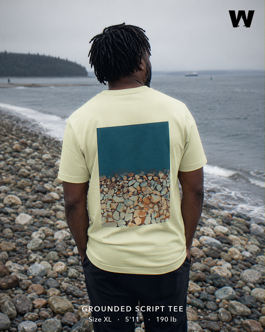 Grounded Script Tee — worn back-print lifestyle