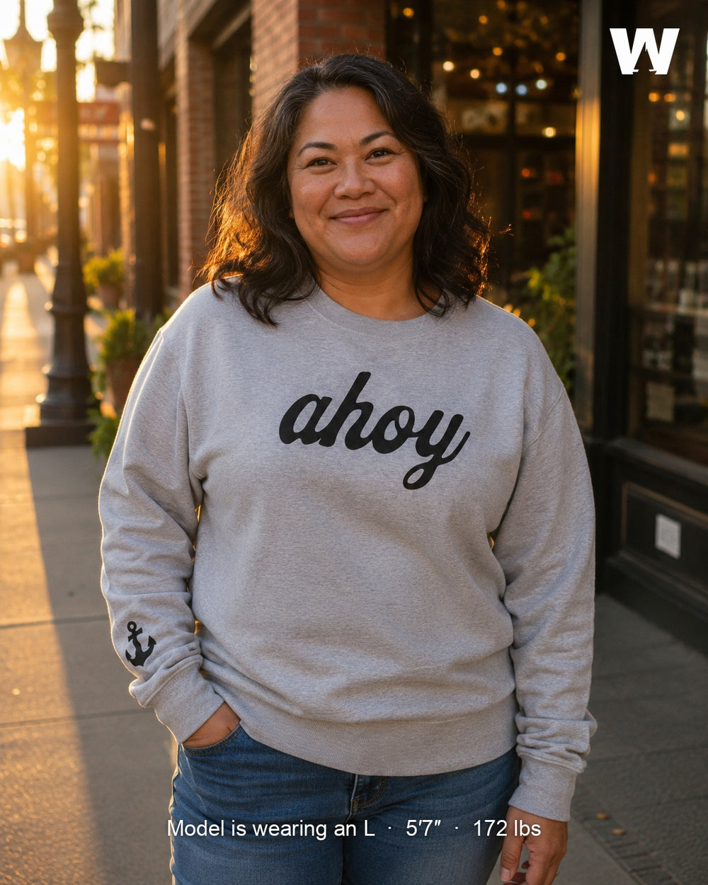 Model wearing the Silky Ahoy Crew in Heather Grey, size L — golden hour, downtown Snohomish