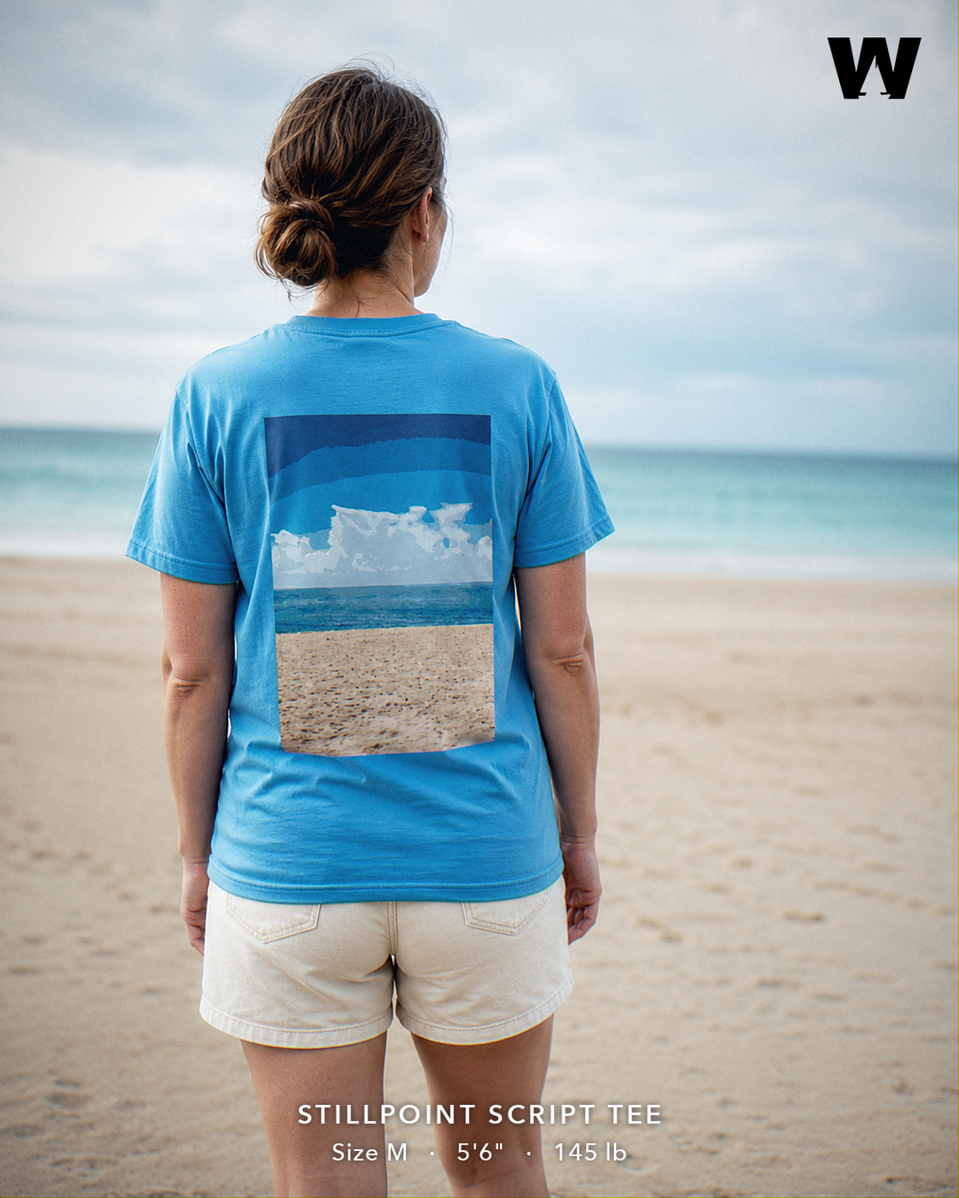 Stillpoint Script Tee — worn back-print lifestyle
