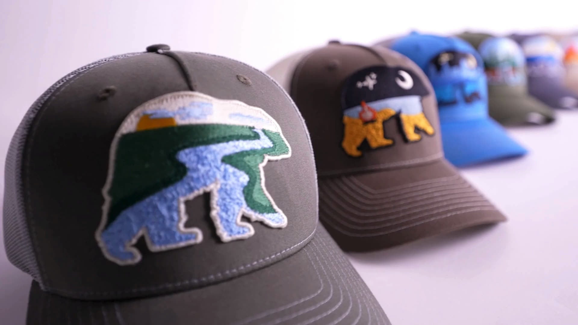 Bear With Me collection — the bear patch worn on the water.