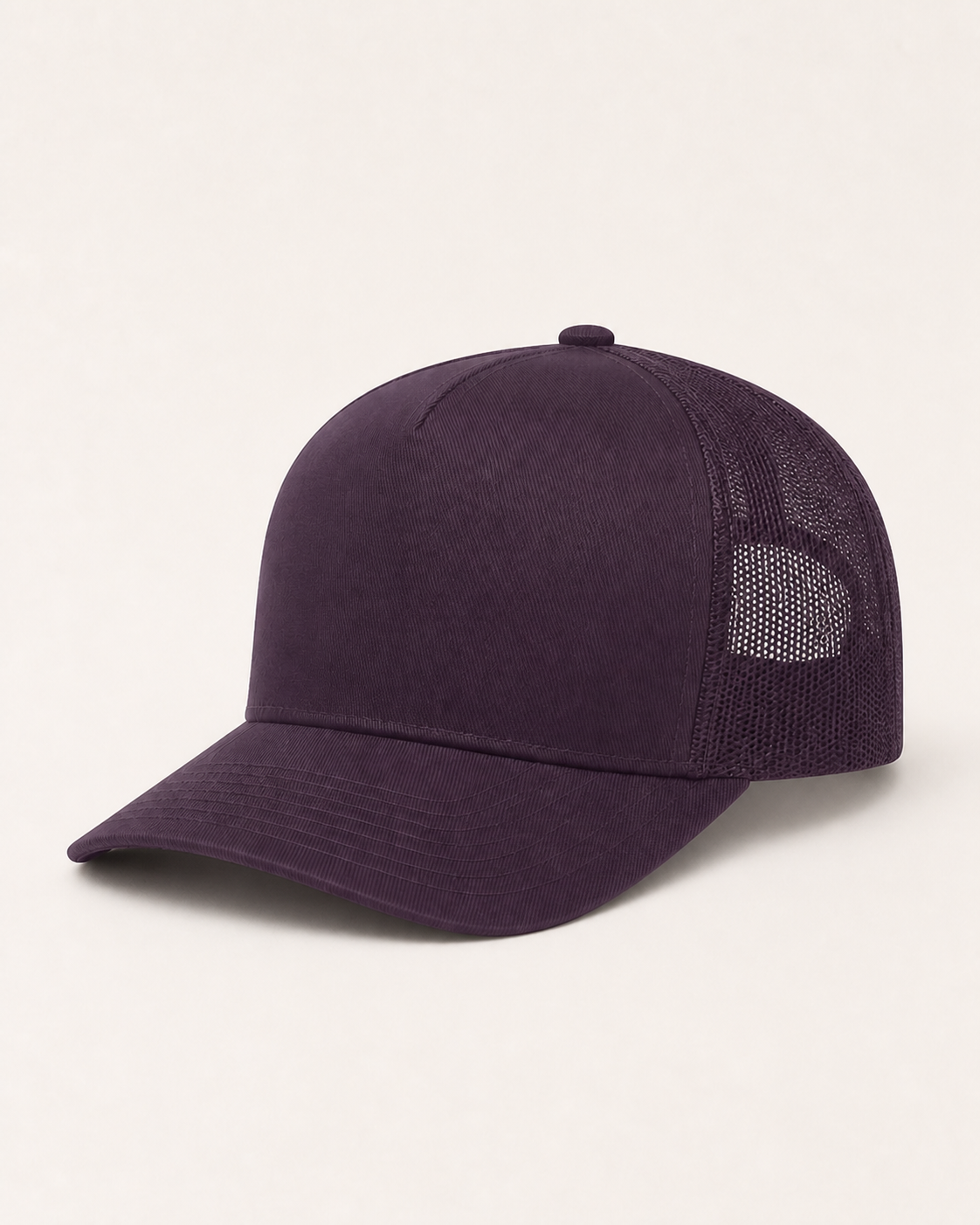 Structured trucker cap with mesh rear panels